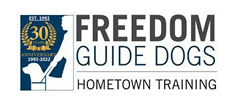 Image of Freedom Guide Dogs logo visit their website button.